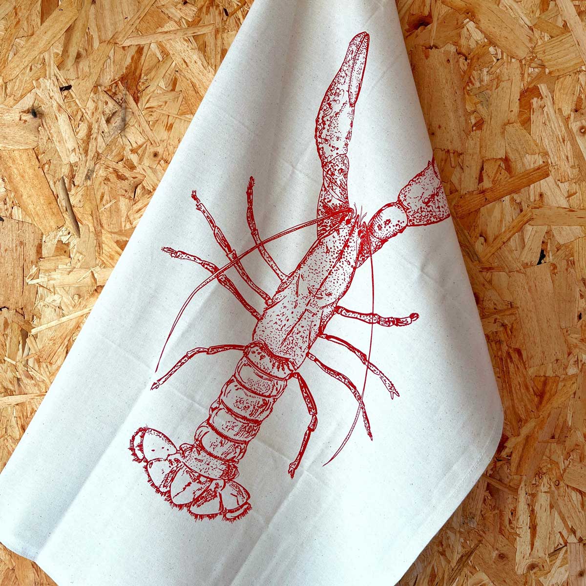 Lottie Day red lobster tea towel with handprinted Norfolk seafood illustration on 100% cotton