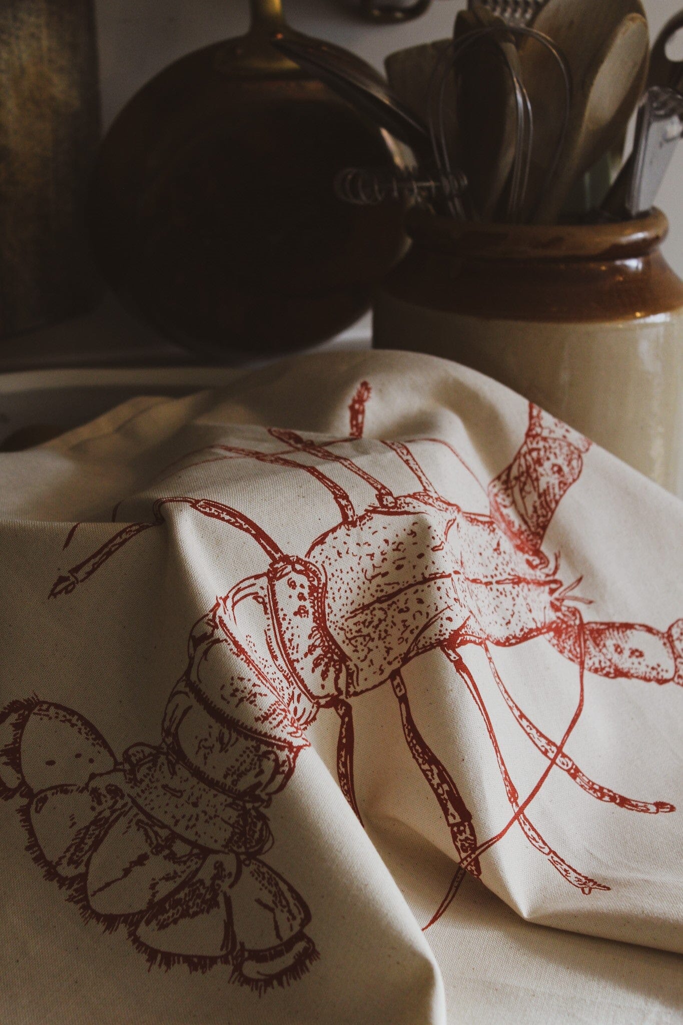 Lottie Day red lobster tea towel with handprinted Norfolk seafood illustration on 100% cotton