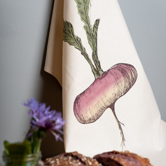 Purple Turnip tea towel by Lottie Day – hand-printed cotton kitchen towel with allotment-inspired root vegetable illustration
