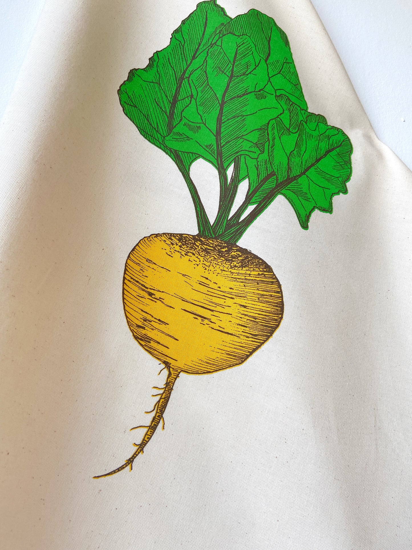 Golden Beet tea towel by Lottie Day – handprinted on cotton with allotment-inspired vegetable illustration, perfect for gardeners and cooks