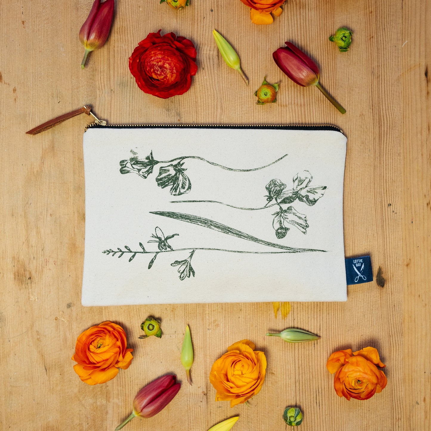 Garden flowers zipper pouch by Lottie Day – handmade cotton canvas bag with floral screen-printed design, inspired by Norfolk gardens