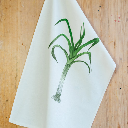 Leek tea towel by Lottie Day – handprinted cotton kitchen towel featuring Norfolk allotment-inspired vegetable illustration