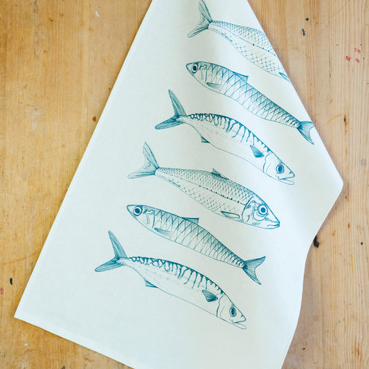 Fish tea towel by Lottie Day featuring handprinted coastal fish illustration – made from cotton and inspired by Norfolk wildlife